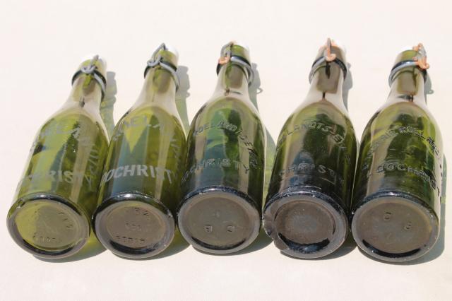 old antique Dutch beer or seltzer water bar bottles, green glass w/ porcelain wire bail lids