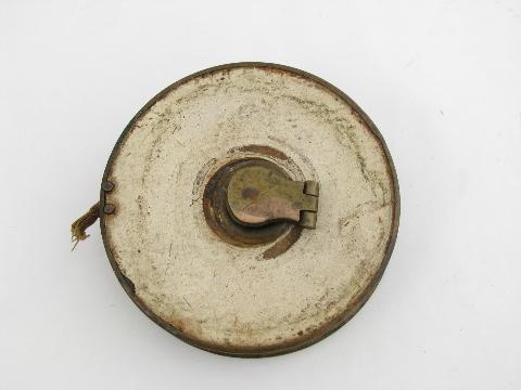 old antique brass and cloth 50ft tape measure, surveyor / carpenter's tool