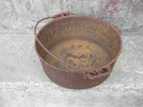 old antique cast iron dutch oven pot for wood stove/campfire cooking