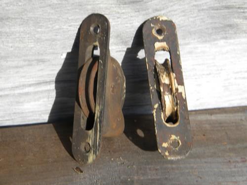 old antique cast iron windows sash weight pulleys for clothes line etc