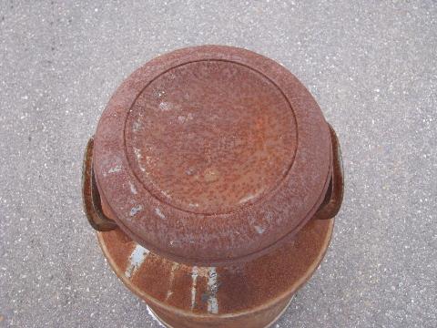 old antique primitive milk can for yard, nice patina
