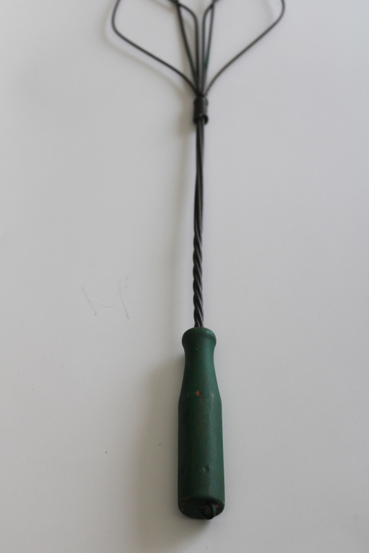 old antique rug beater w/ green painted wood handle, Victorian or Edwardian vintage