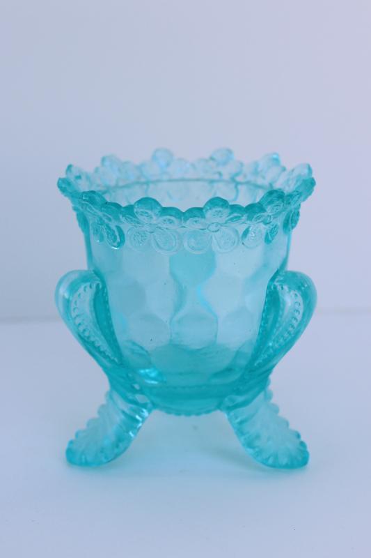old aqua glass toothpick holder or match vase w/ flower border, makes a nice egg cup!