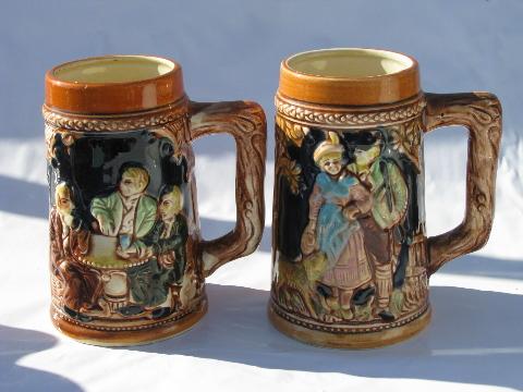 old beer steins set, 8 mugs w/ embossed scenes, vintage Japan
