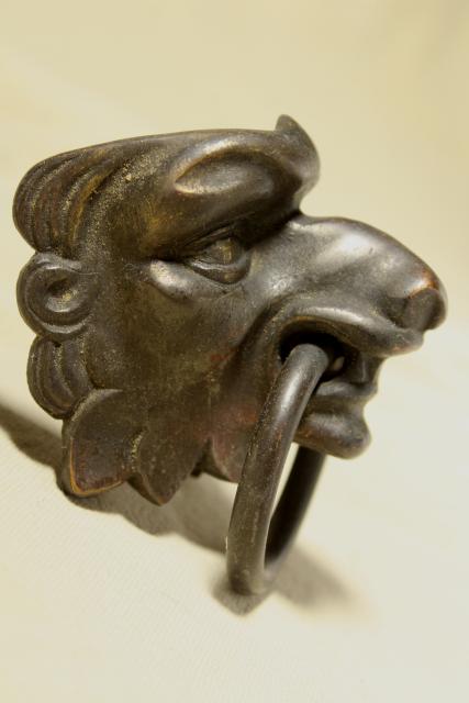 old cast metal gargoyle lion heads, vintage ornamental hardware for clock, fireplace or furniture