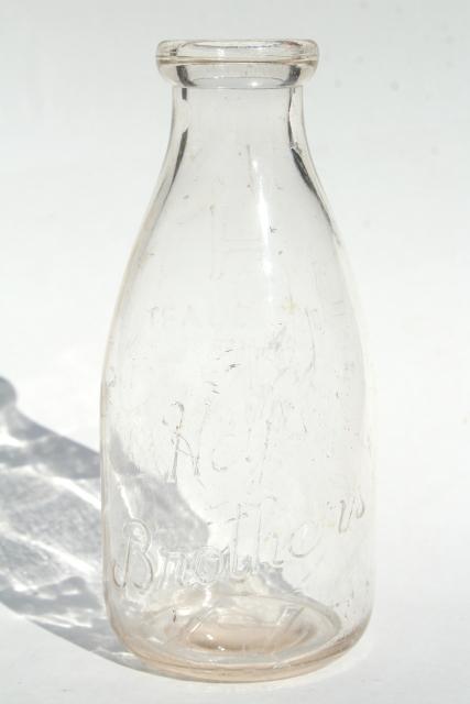 old embossed glass milk bottles, Hey Brothers big & baby brother bottle, 1940s vintage
