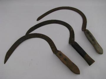 old farm tools, lot of vintage corn knives, sickle cutter blades