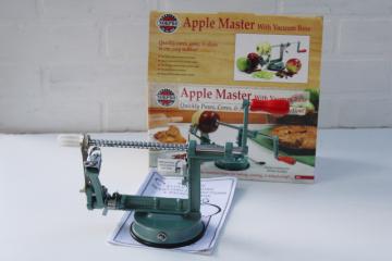 old fashioned green metal hand crank apple peeler corer slicer, vintage style kitchen tool