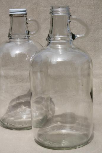 old glass jugs, gallon & half-gallon jug bottles one w/ coca-cola syrup label