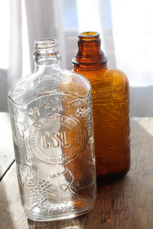 old glass liquor bottles, fancy embossed pattern glass wine & whiskey bottle flasks