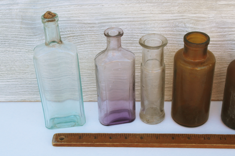 old glass medicine bottles, amber brown, aqua, lavender tint clear glass vintage bottle lot