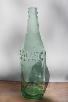 old green glass bottle embossed devil Pluto tonic water vintage quack medicine