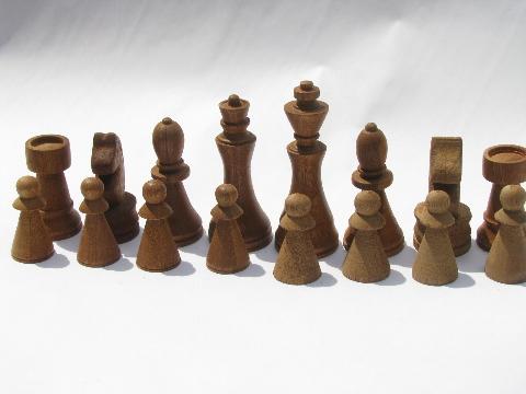 old hand-crafted turned wood chess set game pieces, carved hardwoods