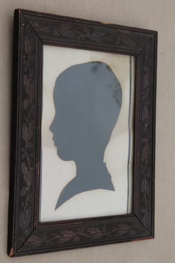 old paper silhouette picture in antique oak leaf and acorn carved wood frame