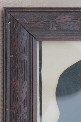 old paper silhouette picture in antique oak leaf and acorn carved wood frame