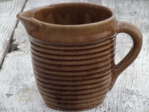 old pottery milk jug, antique brown ribbed  band stoneware pitcher