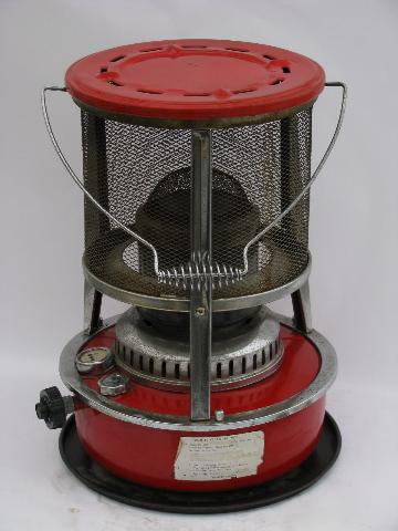 old red enamel kerosene camp heater, vintage camping gear