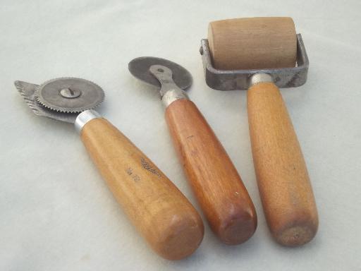 old rotary cutting blade wheels, vintage wallpaper paper hanger tools