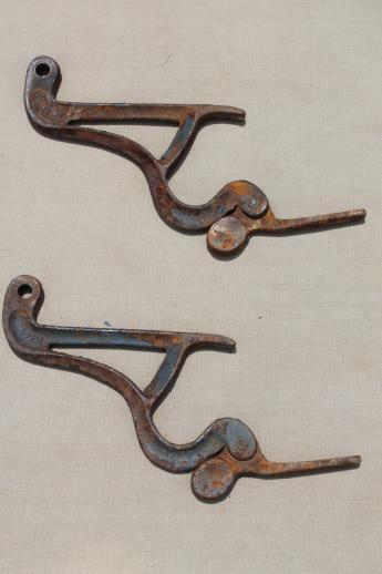 old rusty  iron hardware ladder hooks,  vintage farm primitive tool