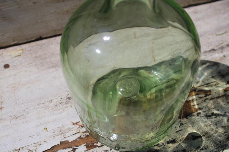 old sea green glass bottle from French cognac, embossed France vintage bottle