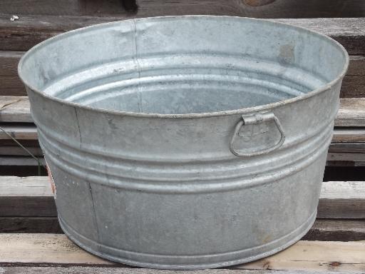 old wash tub galvanized metal washtub w/ original vintage Wheeling label.