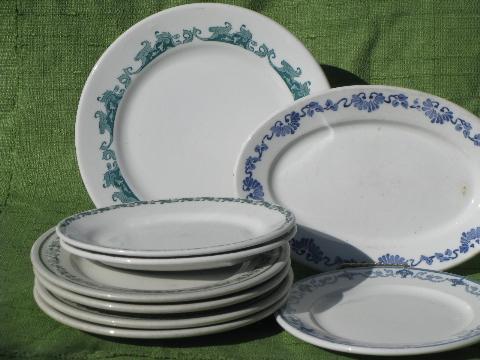old white ironstone china plates and platters, borders in green, blue, aqua