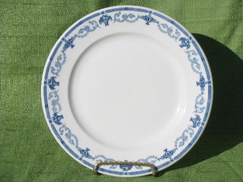 old white ironstone china plates and platters, borders in green, blue, aqua