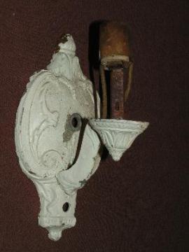 ornate antique cast metal wall sconce shabby white paint