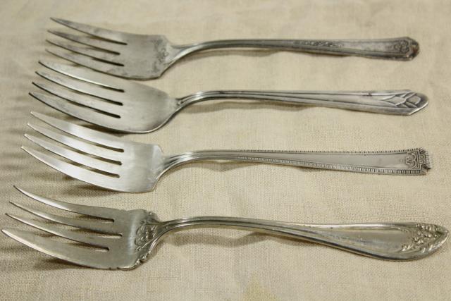 ornate antique silverware, collection of large serving forks, vintage silver plate flatware