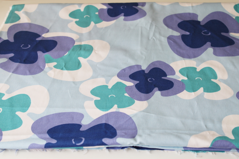 outdoor canvas fabric, modern abstract floral print, pinwheel flowers in lavender, navy, aqua on light blue