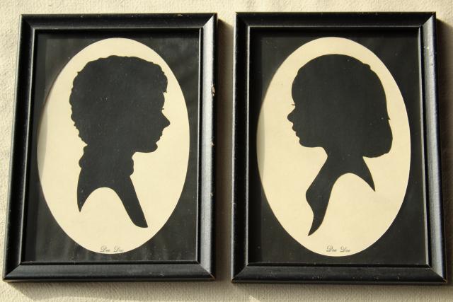 pair framed vintage silhouette paper cuts, 1940s boy & girl portraits