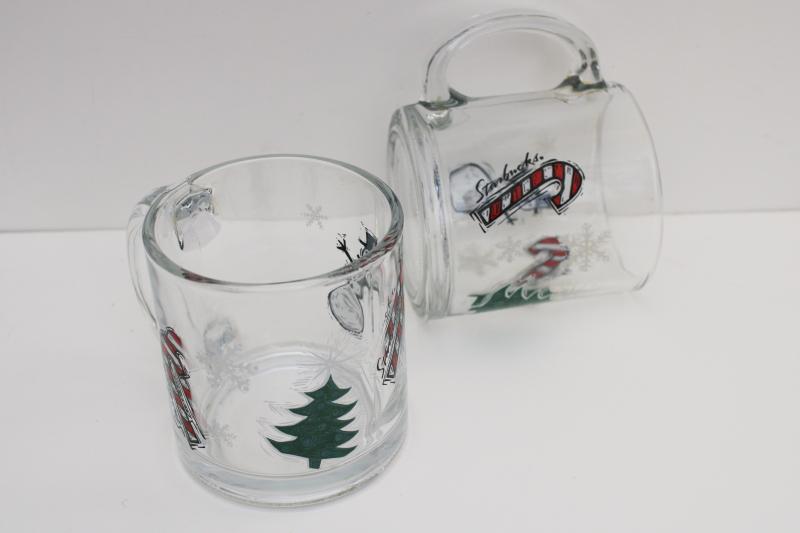 pair of Starbucks glass coffee mugs w/ Christmas tree, snowman, candy canes 