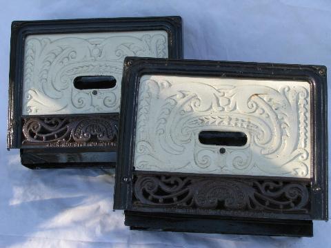 pair of antique architectural heating registers, ornate cast iron grates