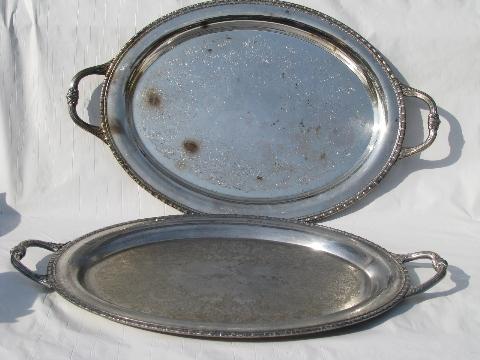 pair of large oval silver plated serving trays w/ handles, vintage silver plate