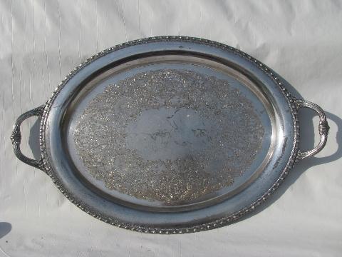pair of large oval silver plated serving trays w/ handles, vintage silver plate