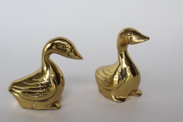 pair of polished brass ducks, solid metal animal figurines w/ shiny gold  color