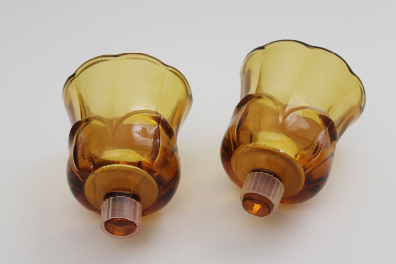 pair of vintage amber glass peg style votive candle holders lotus shape