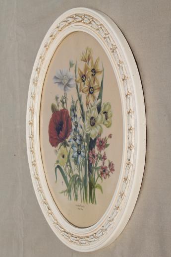 pair of vintage floral botanical flower prints in oval wood picture frames