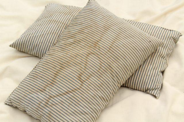 primitive grubby vintage cotton ticking pillows, feather filled bed pillows