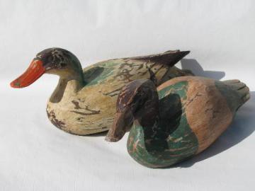 primitive hand-carved wood folk art painted duck decoys for cabin or lodge