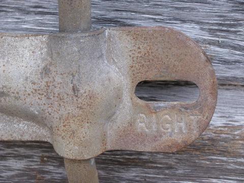 primitive harness or coat hook pegs, antique glass insulators on steel bracket rack