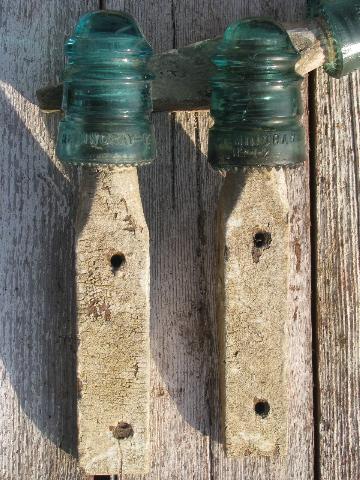 primitive harness or coat hooks, old barn board wood pegs w/ antique glass insulators