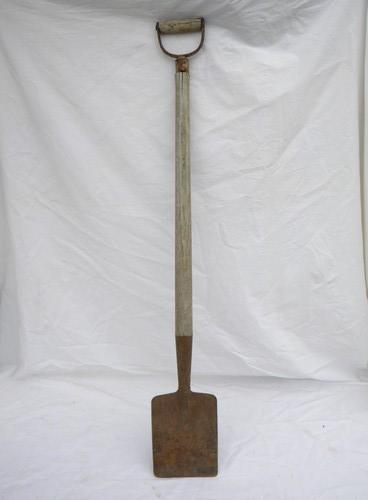primitive old garden tool, a small shovel or spade