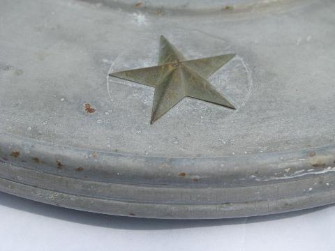 primitive vintage electric light, old brass stars on galvanized metal