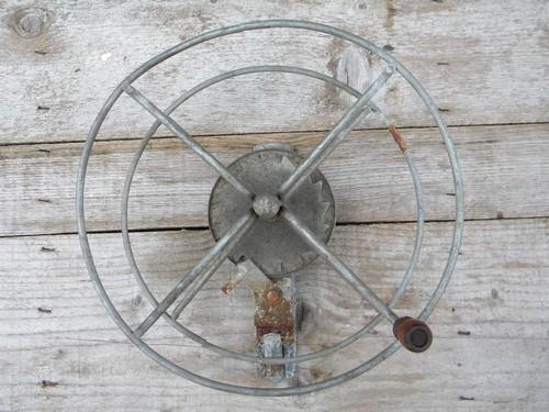 primitive vintage wire winding reel for garden hose, laundry line, rope