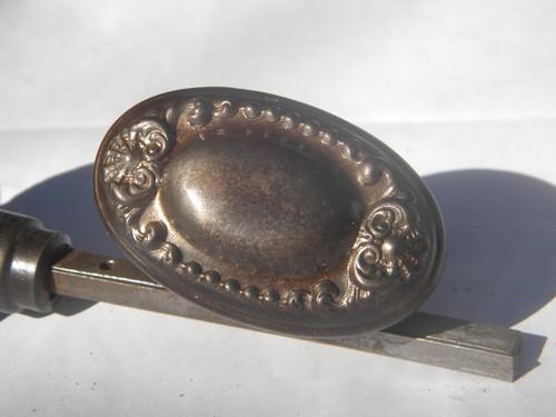 rare antique Victorian vintage ornate cast iron oval door knob
