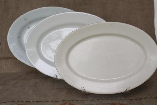 rustic farmhouse kitchen old white ironstone china platters, graduated sizes stack
