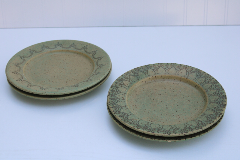 rustic hand thrown pottery plates, heavy stoneware muted green glaze w/ filigree pattern borders