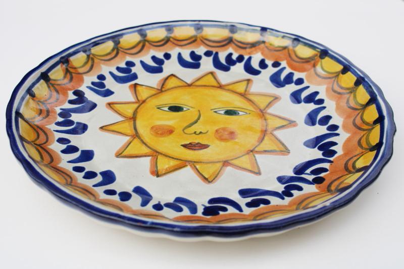rustic vintage pottery bowl w/ hand painted sun face, unmarked Mexico or Spain