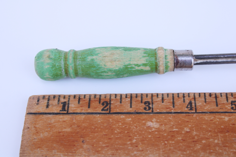 rustic vintage toasting fork or campfire marshmallow toaster, old green paint wood handle